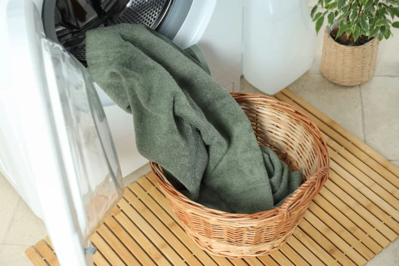 Wooden laundry basket in bathroom