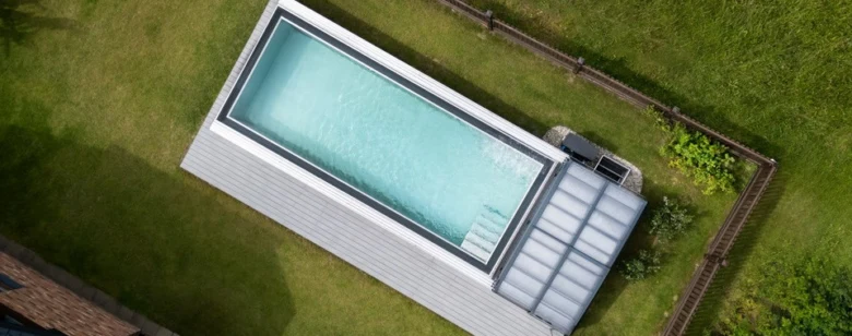 Rectangular swimming pool with cover