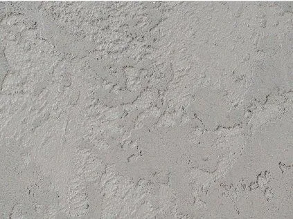 Textura betonové stěrky na vnitřní zeď s viditelnou strukturou.