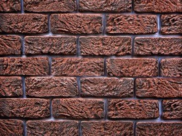 Detailní pohled na cihlový obklad pro fasádu budovy.