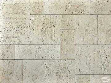 Moderní dekorativní obklady ze světlého kamene pro stěny.