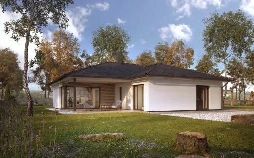 Moderní L-podlažní bungalov v přírodě s velkými okny.