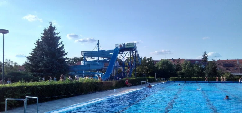 Outdoor pool with water slide